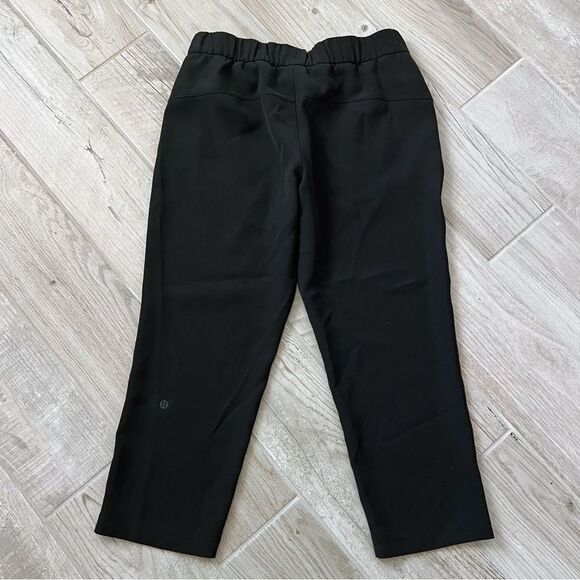 LULULEMON | On The Fly Crop Pants 23" in Black, Size 8 - Picture 4 of 12